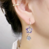 Aretes con forma de gota y flores