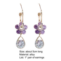 Aretes con forma de gota y flores